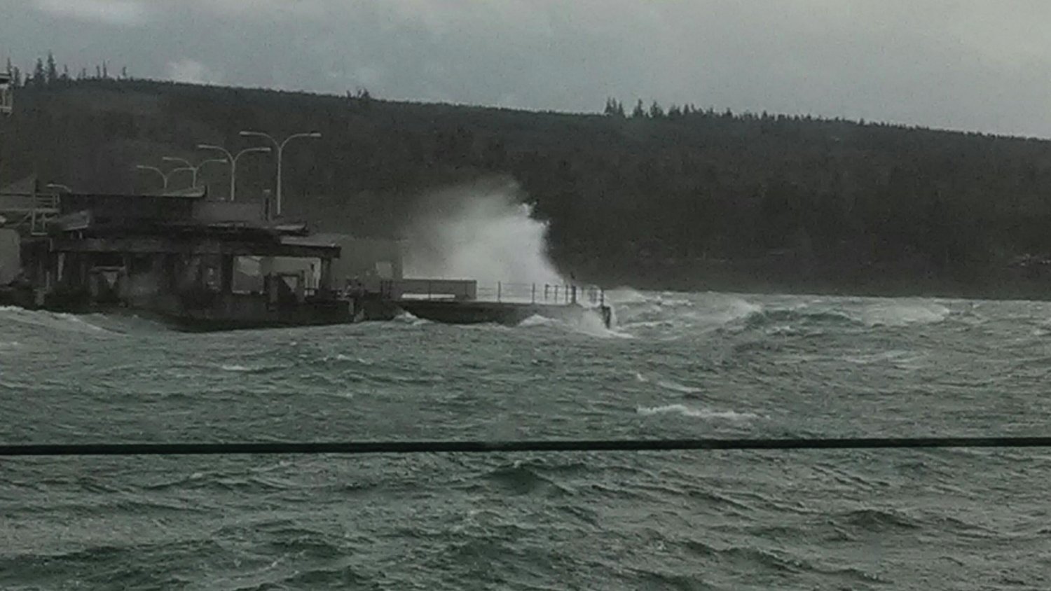 The waves going onto the Hood Canal Bridge deck  Tuesday morning were reaching nearly 30 feet in the air, officials said.  